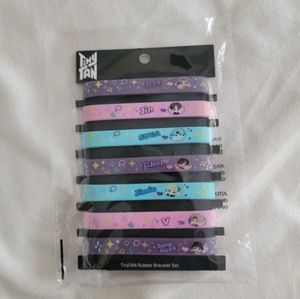 Tiny tan rubber bracelets